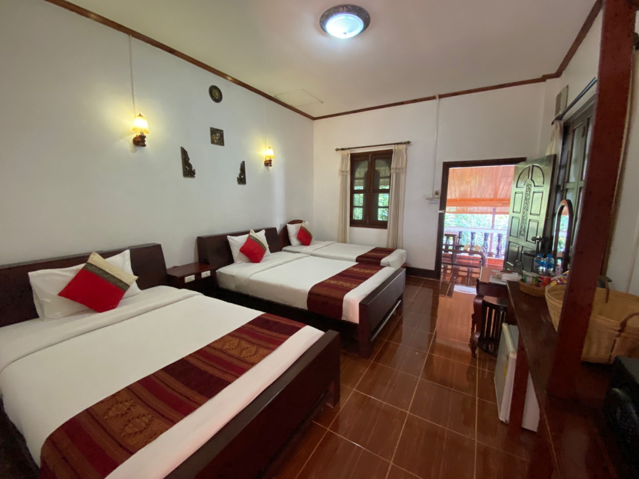 triple room pool view | minibar, in-room safe, individually decorated, desk