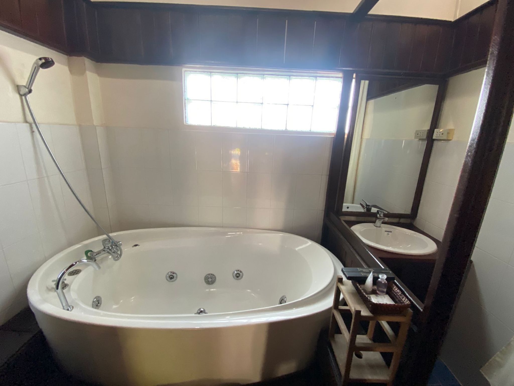 deluxe double room pool view | bathroom | free toiletries, hair dryer, slippers, towels