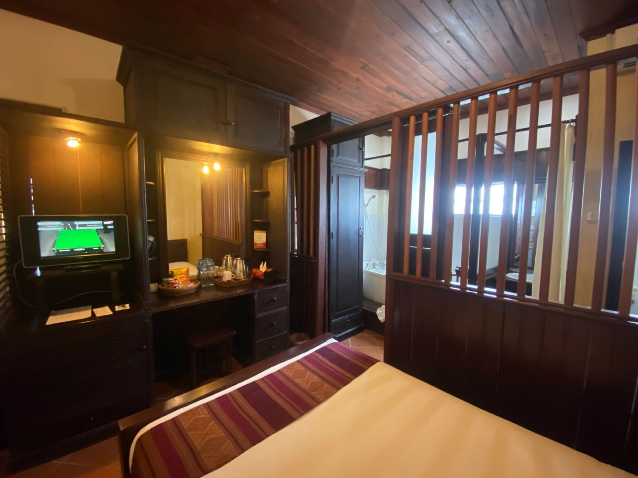 deluxe double room pool view | minibar, in-room safe, individually decorated, desk