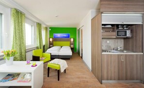 Premium bedding, desk, blackout curtains, soundproofing