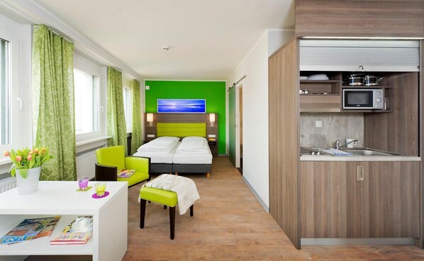 Premium bedding, desk, blackout drapes, soundproofing