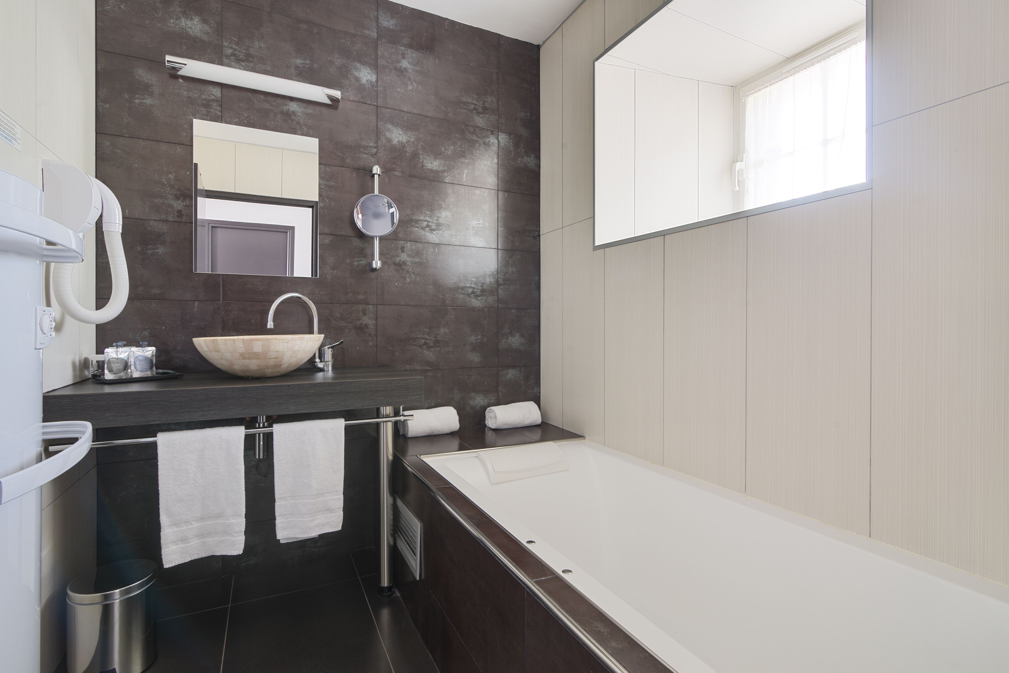 deluxe double room | bathroom | designer toiletries, hair dryer, towels