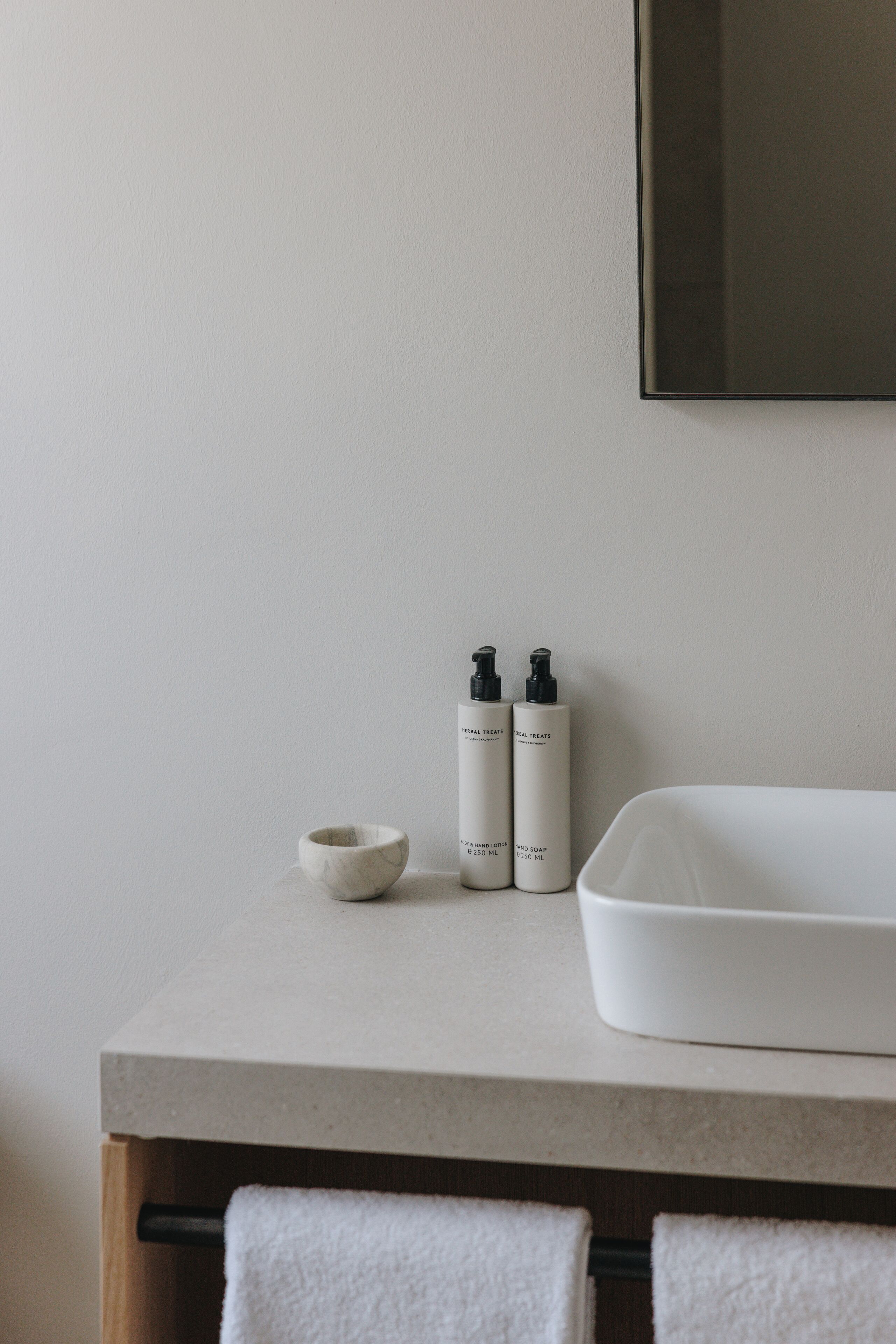 designer toiletries, hair dryer, bathrobes, heated floors