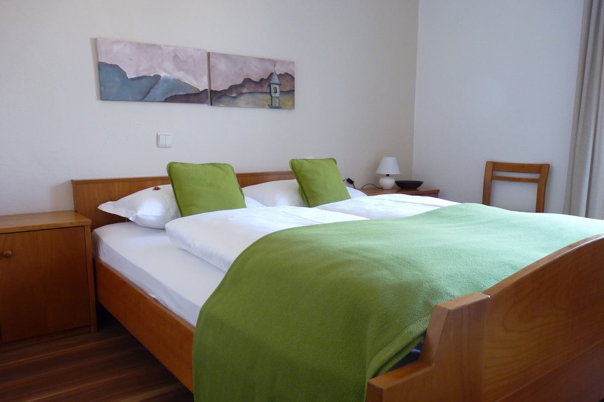 Down duvets, desk, iron/ironing board (on request), free WiFi