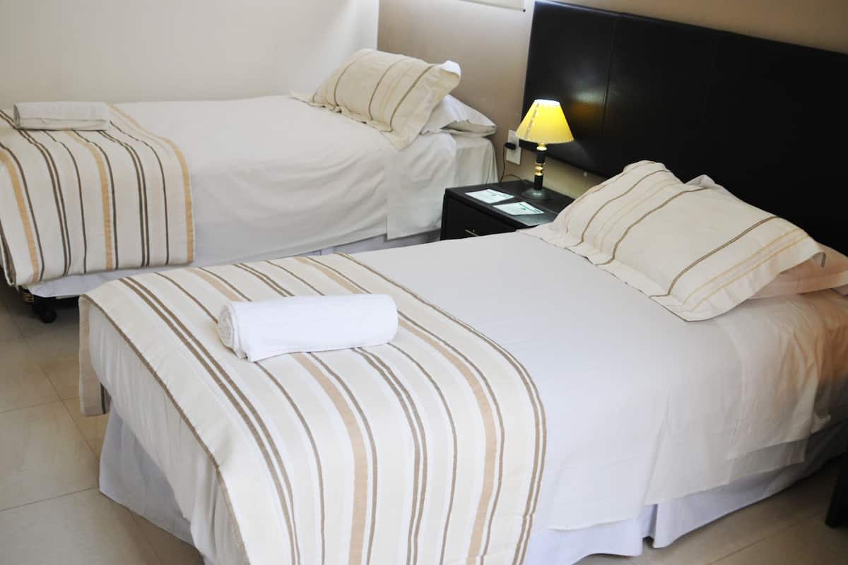 Quarto standard | Frigobar, cofres nos quartos, cortinas blackout, berços grátis