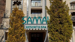 A building with a sign reading "SAMAL RESORT & SPA". - Samal Resort & Spa (Almaty)