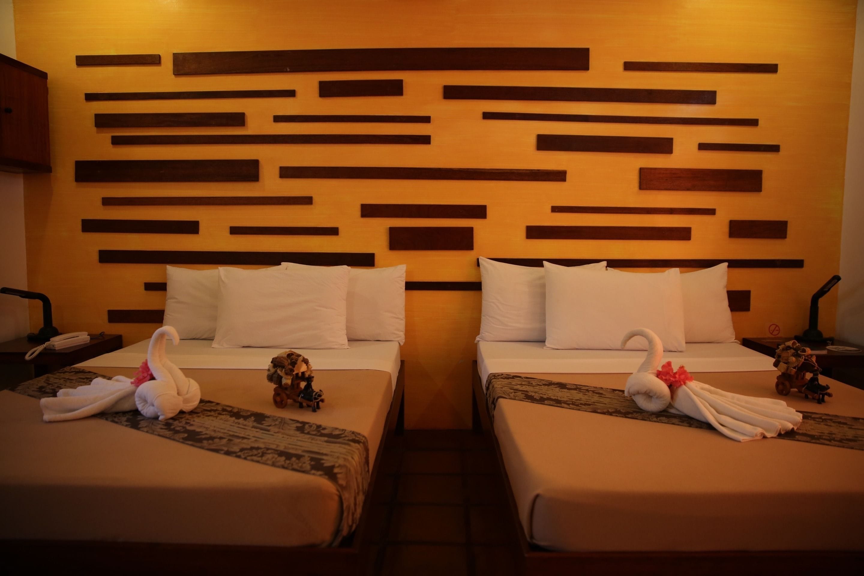 family superior room with 2 double beds | desk, free wifi, bed sheets