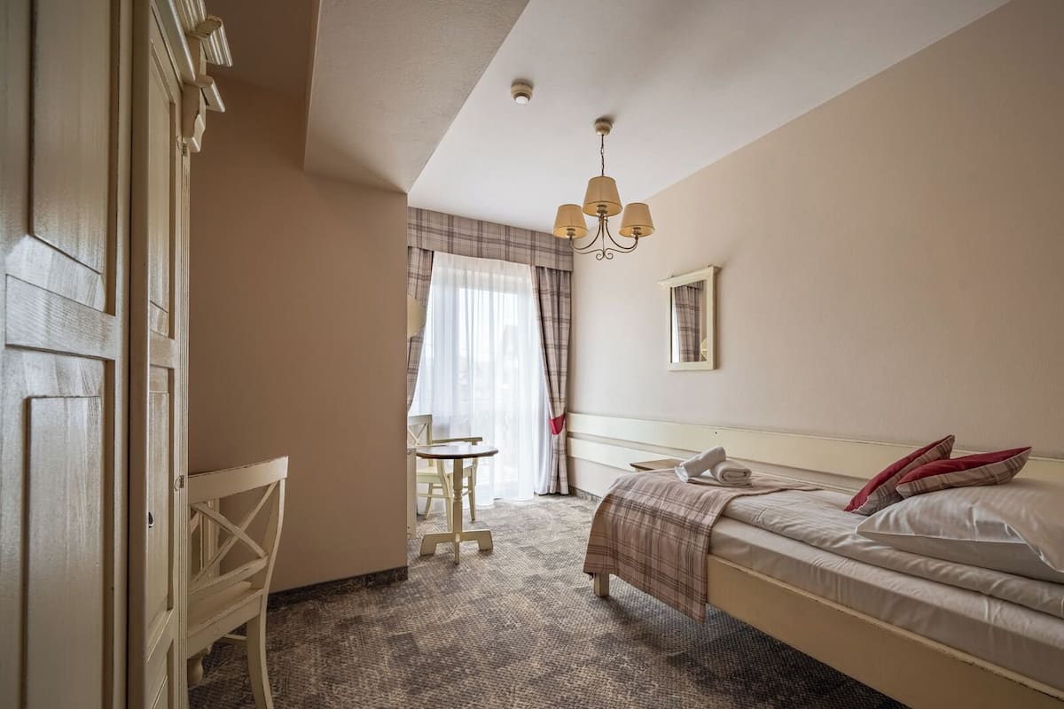Single Room | Hypo-allergenic bedding available, desk, blackout drapes, soundproofing