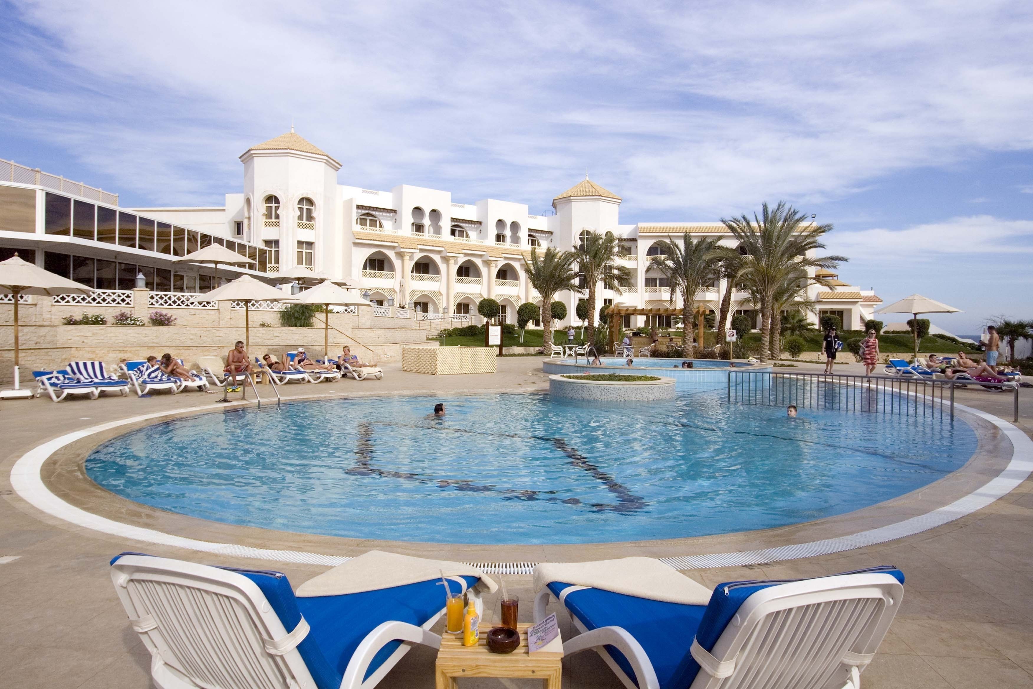 2 outdoor pools, pool umbrellas, pool loungers