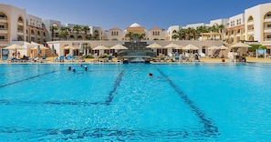 2 outdoor pools, pool umbrellas, pool loungers