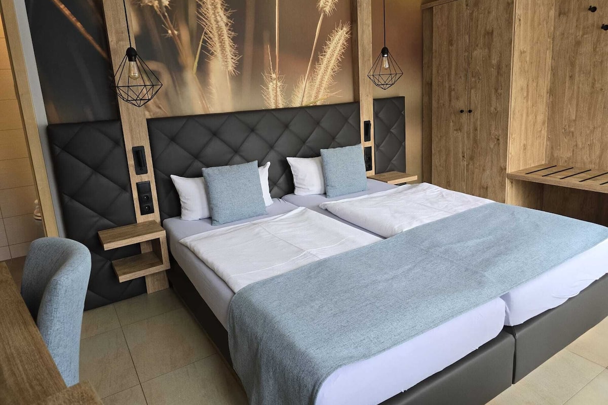 Biancheria da letto di alta qualità, una cassaforte in camera