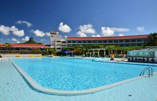 Outdoor pool, open 7:00 AM to 6:00 PM, sun loungers, lifeguards on site