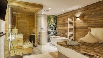 Suite Prestigio | Área de sala de estar | Televisión de pantalla plana