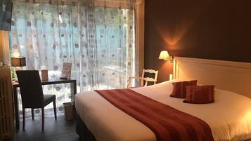 Premium Double Room | In-room safe, individually decorated, desk, blackout drapes