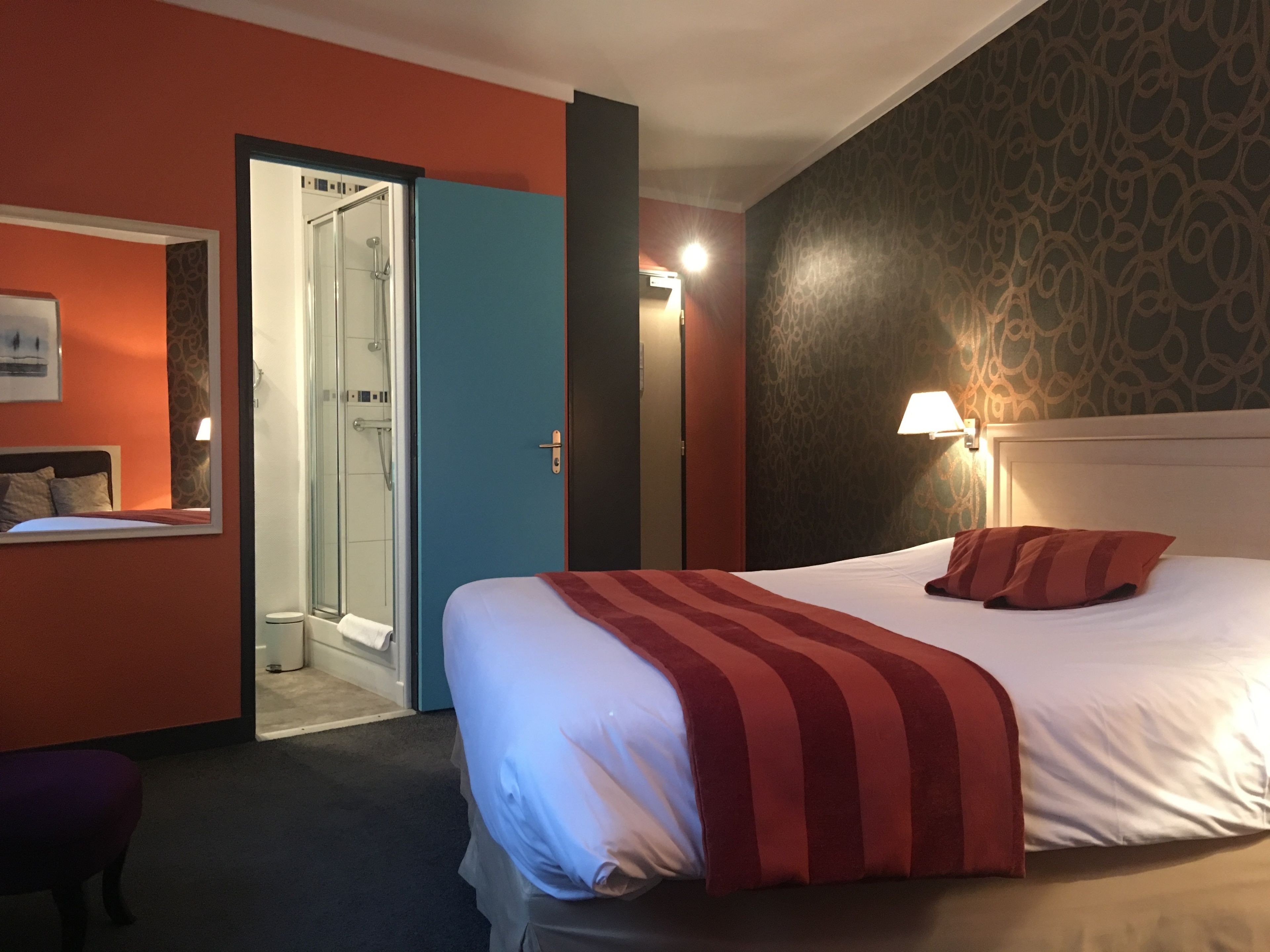 premium double room | in-room safe, individually decorated, desk, blackout curtains