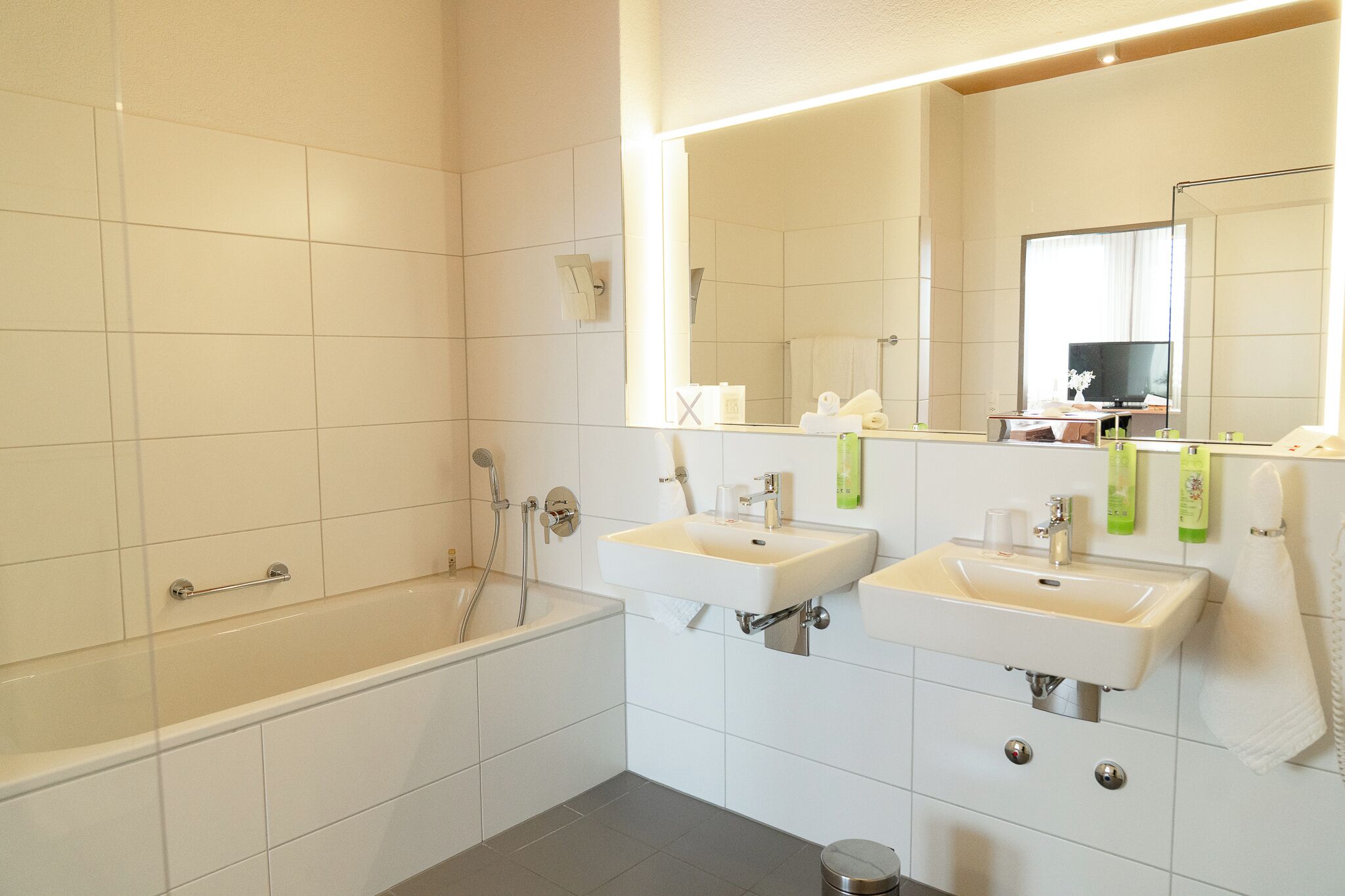 shower, hair dryer, bathrobes, slippers