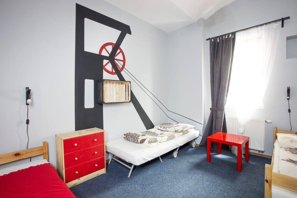 Triple Room, Shared Bathroom | Blackout drapes, iron/ironing board, free WiFi