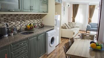 Family Room 2 | Private kitchen | Full-size fridge, microwave, coffee/tea maker, cookware/dishes/utensils