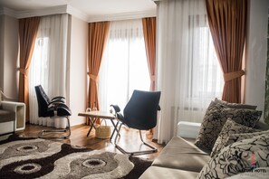 Family Room 1 | Salle de séjour | Téléviseur au plasma, planchers chauffants