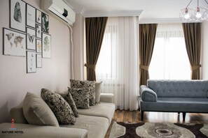 Family Room 2 | Sala de estar | Televisión de plasma y piso con calefacción 