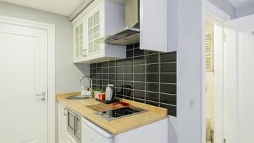 Superior studio | Donsdekens, een minibar, geluiddichte muren, een strijkplank/strijkijzer