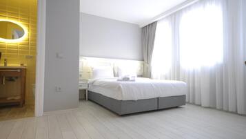 Down duvets, minibar, soundproofing, iron/ironing board