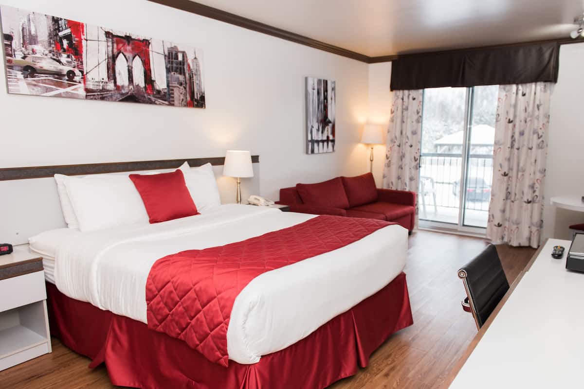 Chambre Double Confort, 1 grand lit et 1 canapé-lit, balcon | Bureau, chambres insonorisées, fer et planche à repasser
