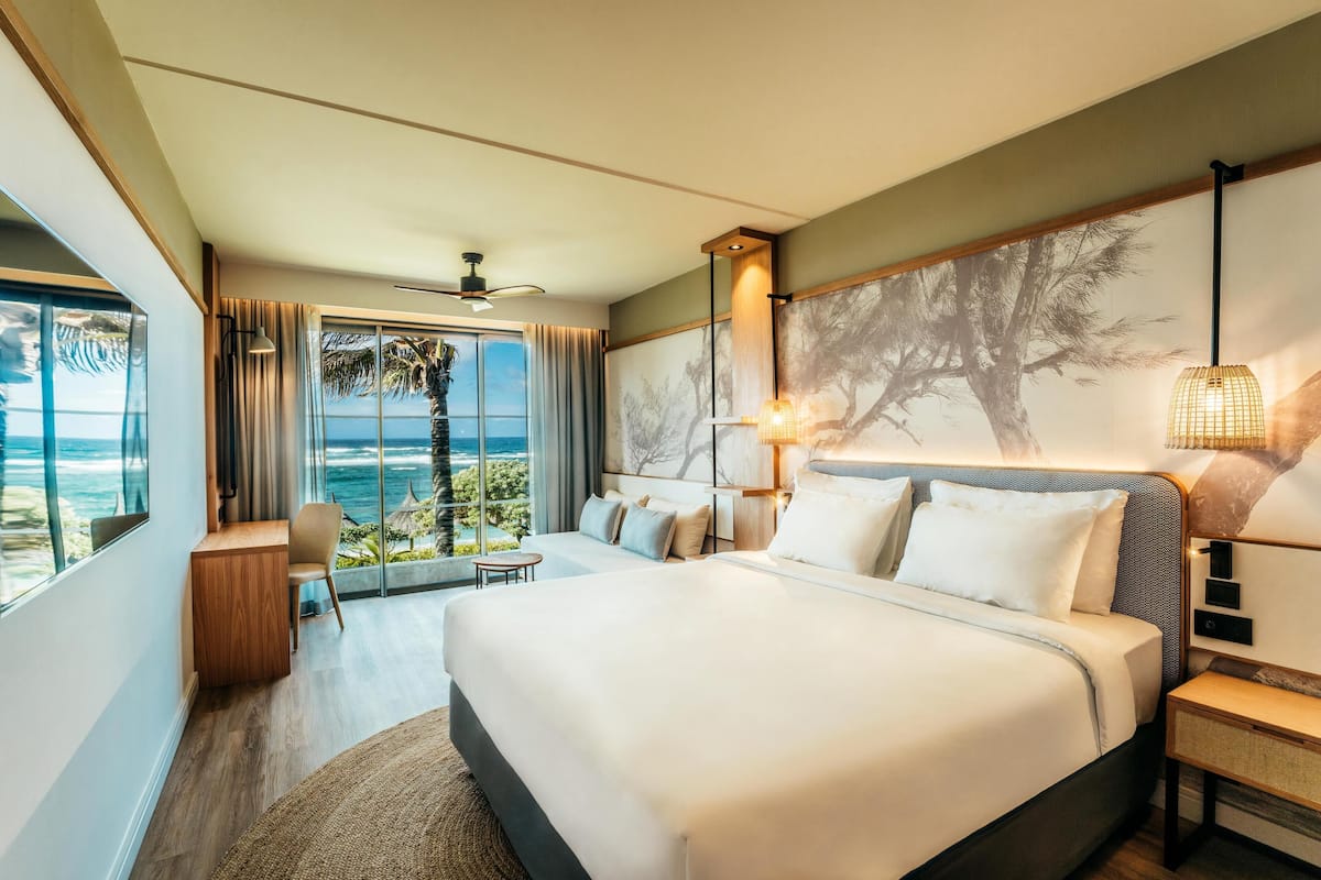 Superior Room, Beachfront | Minibar, in-room safe, desk, laptop workspace