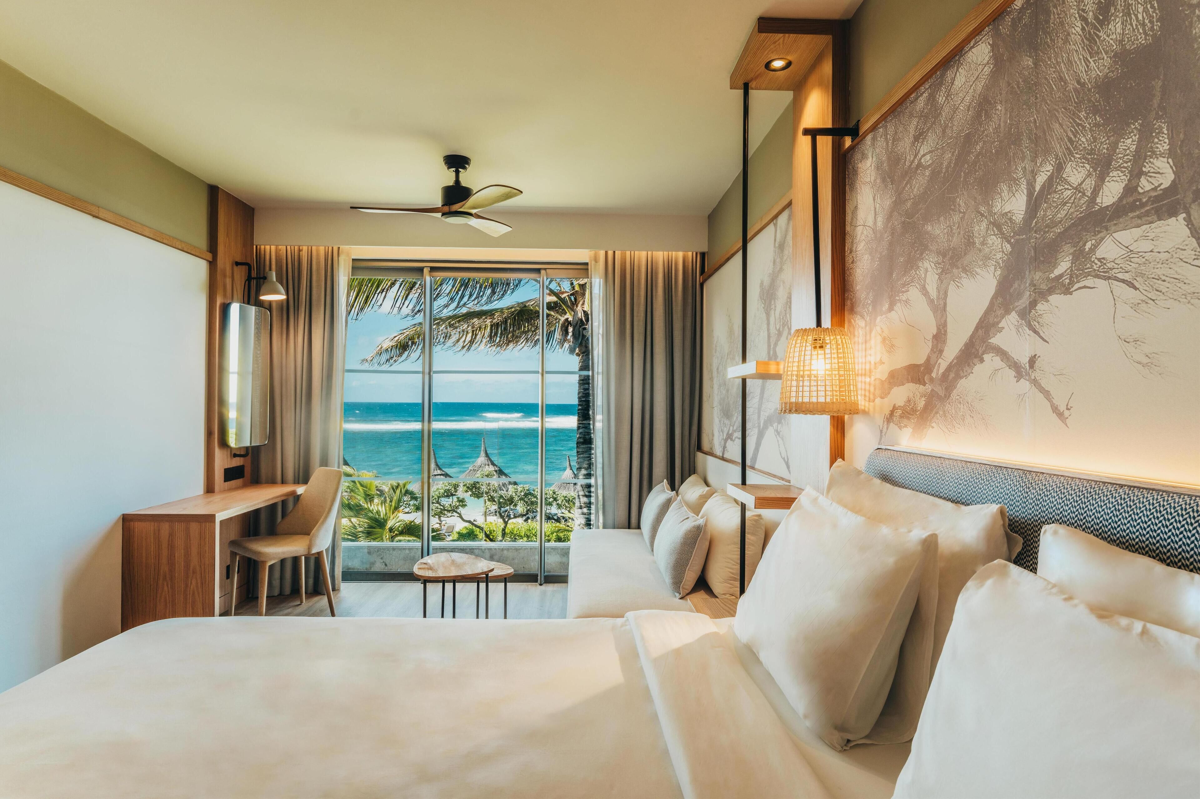 Superior Room, Beachfront | Minibar, in-room safe, desk, laptop workspace