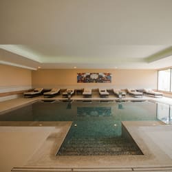 Indoor pool, outdoor pool, pool umbrellas, sun loungers