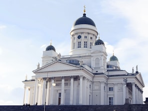 A large, white building with multiple domes and columns, likely a significant historical or cultural landmark. - Omena Hotel Helsinki City Center (Helsinki)
