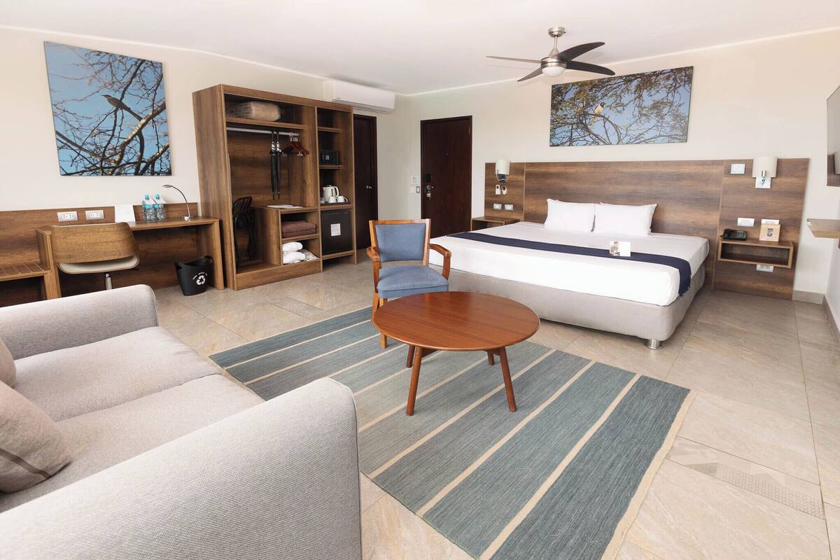 Junior Suite, 1 King Bed | Down comforters, minibar, in-room safe, desk