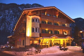 Front of property - evening/night - Hotel Ladina (Campitello di Fassa)