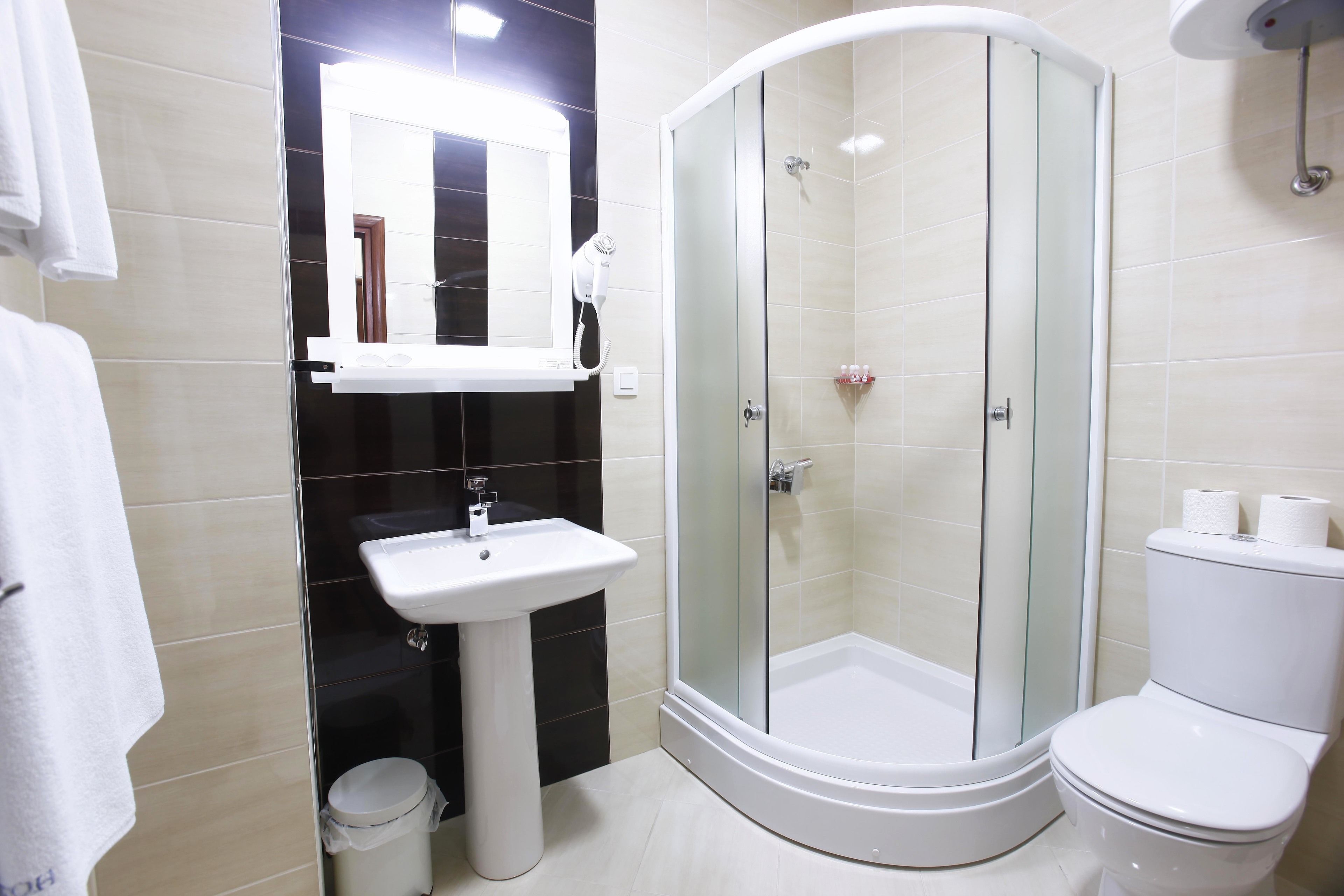 shower, free toiletries, hair dryer, slippers