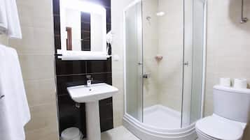 Shower, free toiletries, hair dryer, slippers