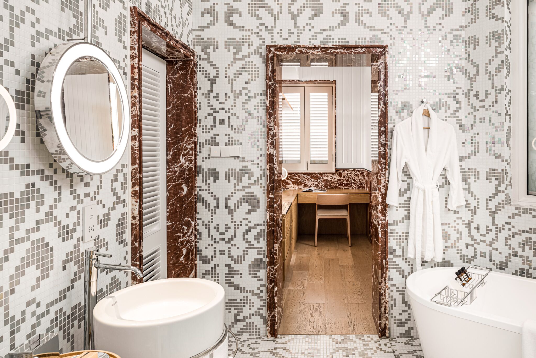 deluxe room, multiple beds | bathroom | designer toiletries, hair dryer, bathrobes, slippers