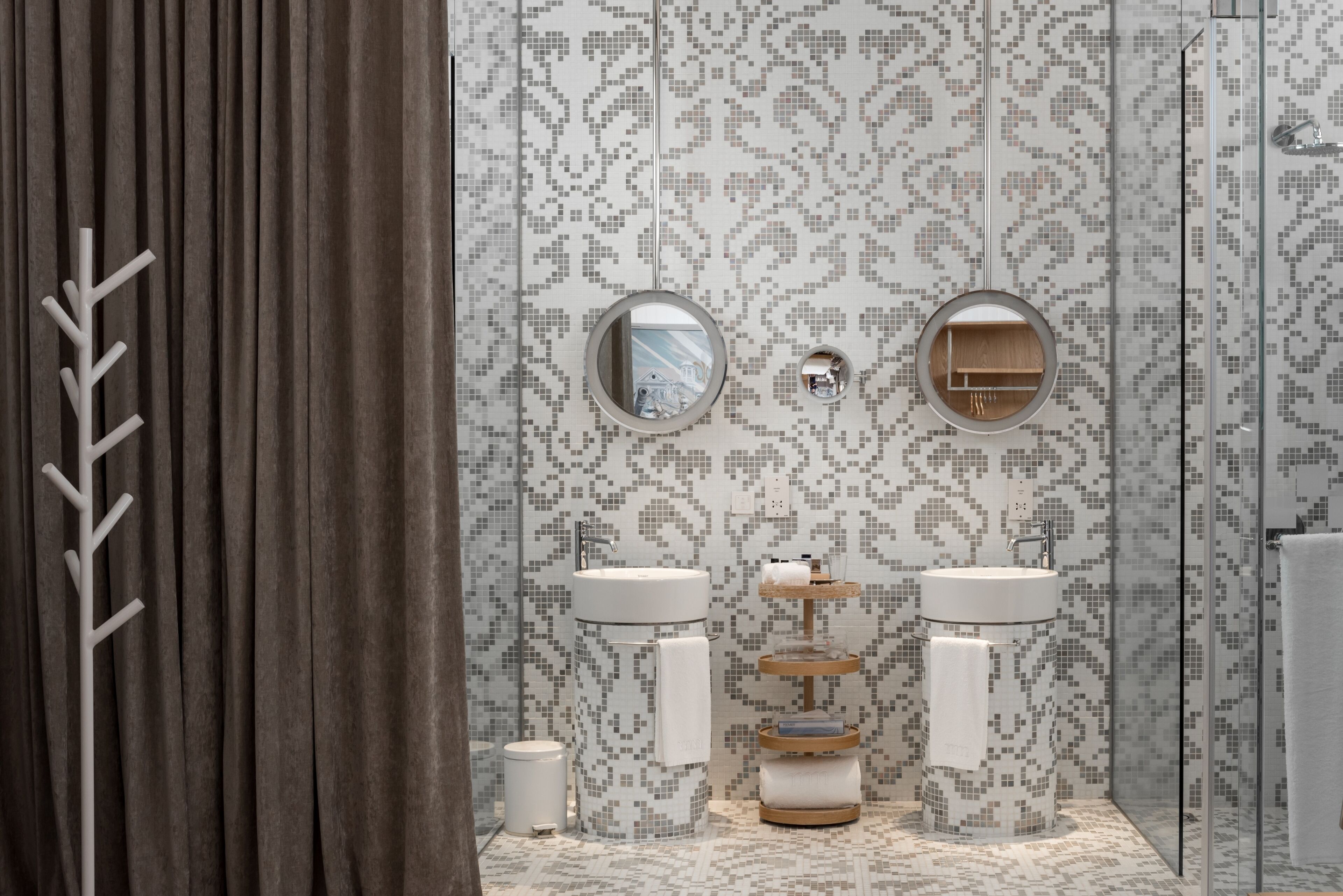 deluxe room, 1 king bed | bathroom | designer toiletries, hair dryer, bathrobes, slippers