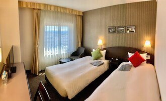 Economy Twin Room, Non Smoking | Desk, iron/ironing board, free WiFi, bed sheets