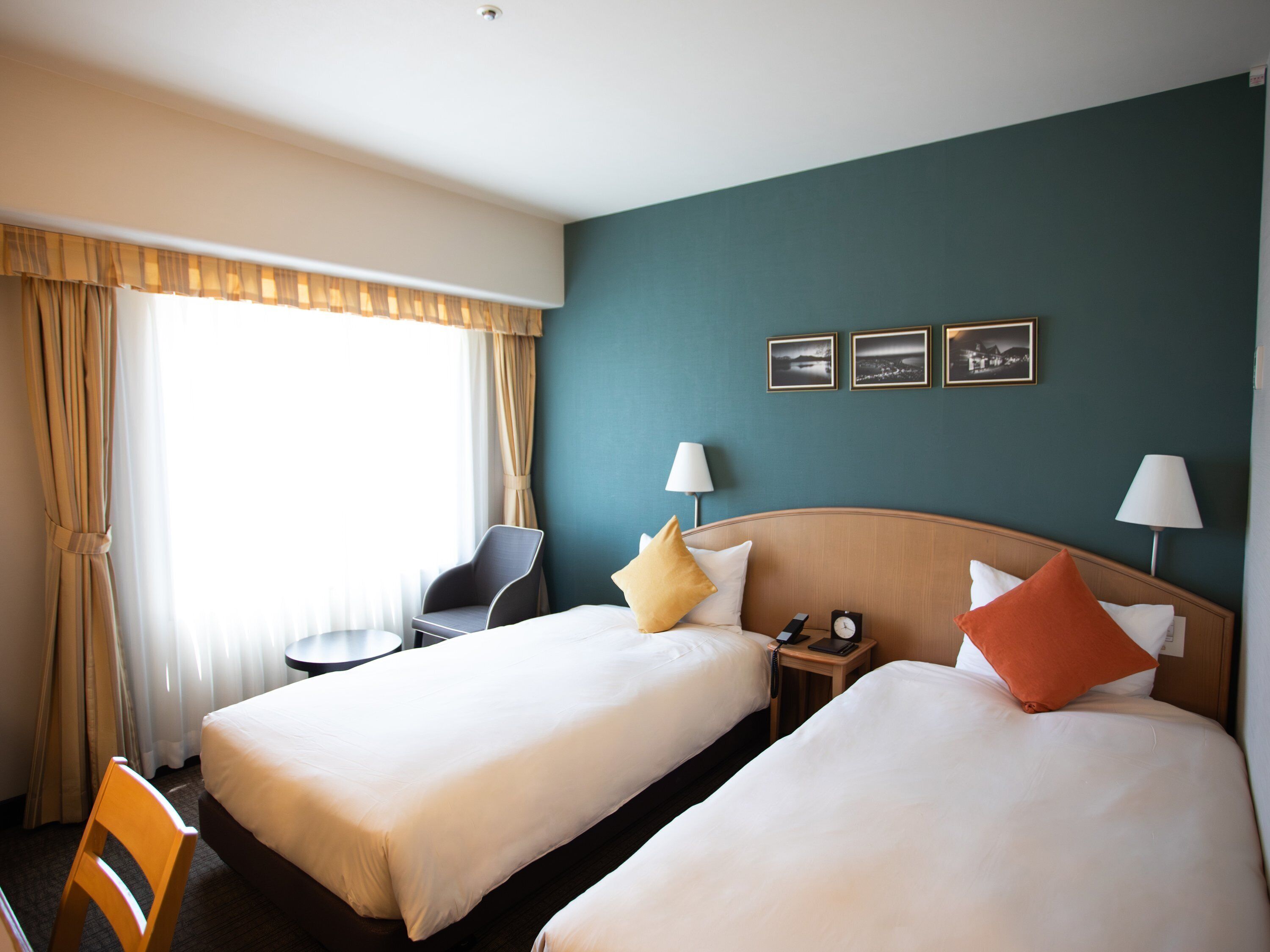 Economy Twin Room, Non Smoking | Desk, iron/ironing board (on request), WiFi (free), bed sheets