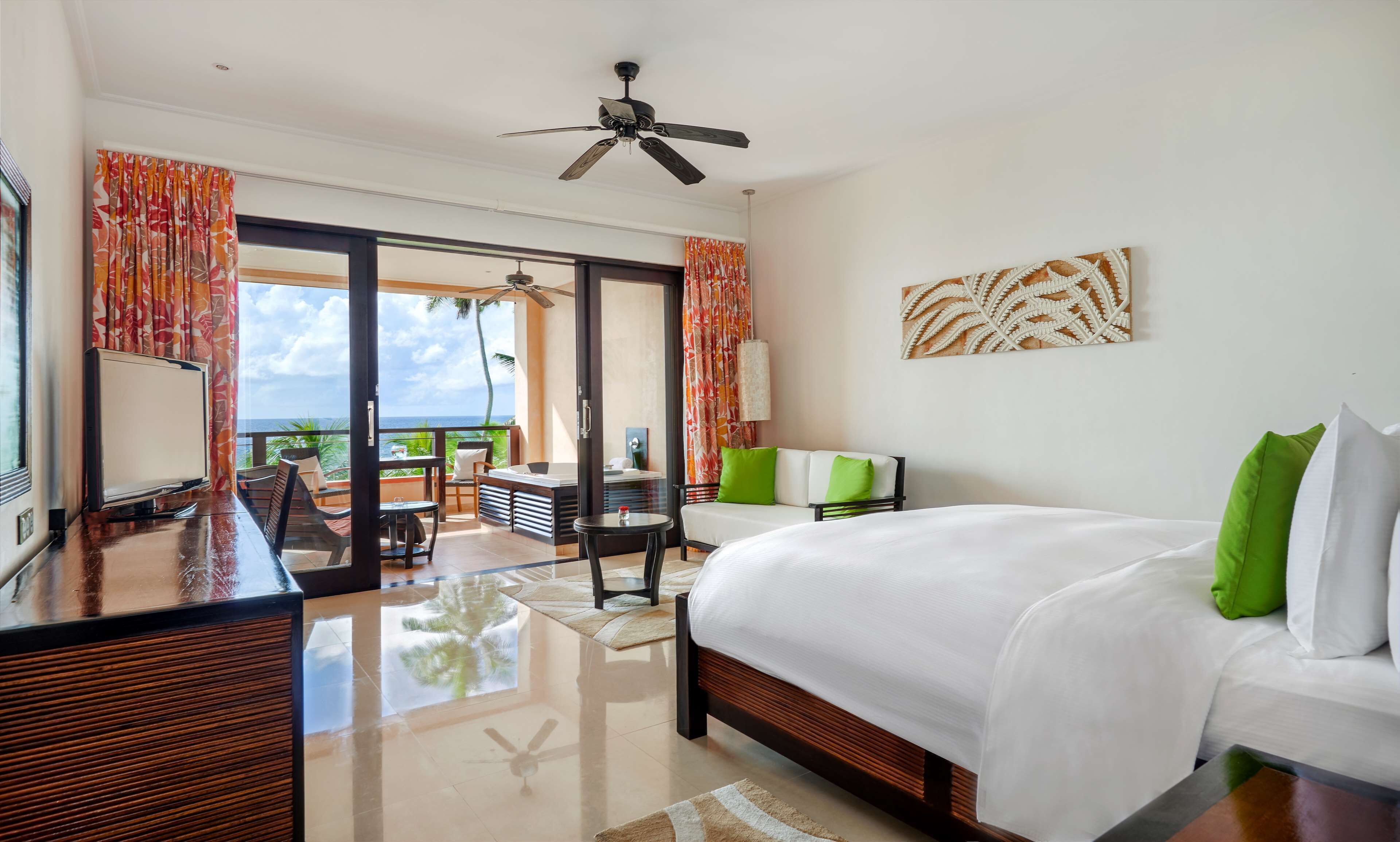 grand room, 1 king bed, beach view, jacuzzi on balcony | hypo-allergenic bedding, minibar, in-room safe, desk