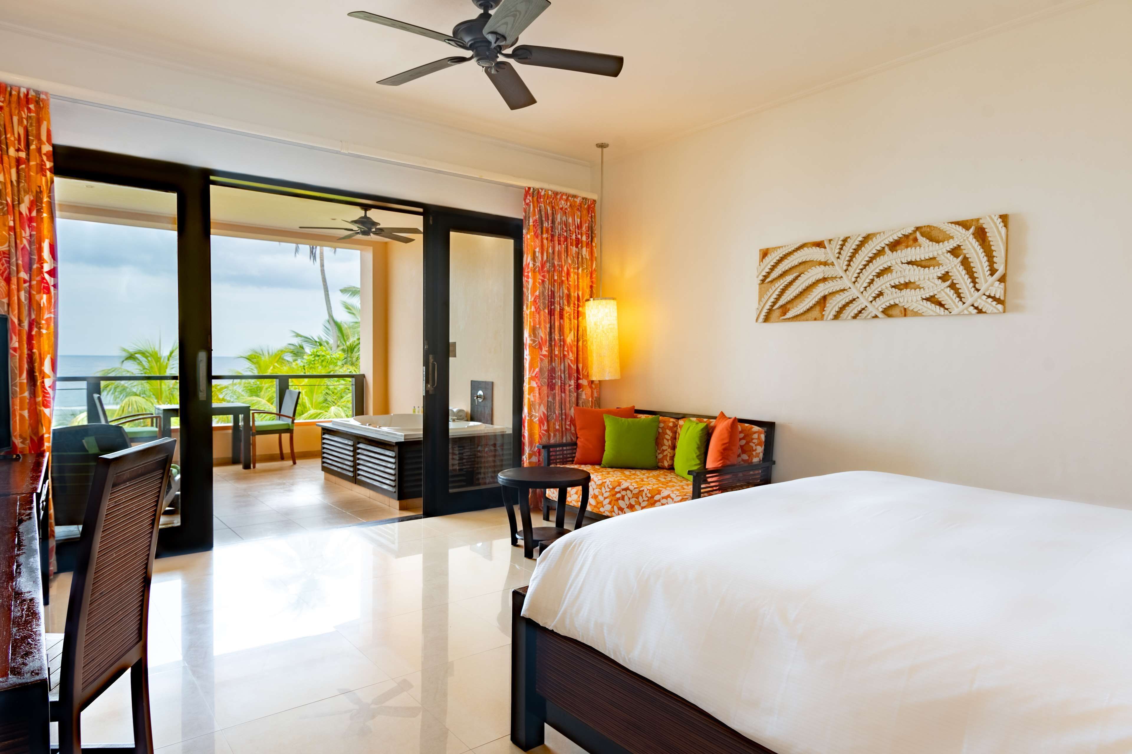 grand room, 1 king bed, beach view, jacuzzi on balcony | hypo-allergenic bedding, minibar, in-room safe, desk