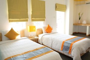 Surmatelas, minibar, coffres-forts dans les chambres