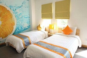 Camas con pillow-top, minibar y caja de seguridad en la habitación 