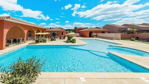 Seasonal outdoor pool, pool loungers