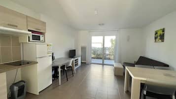 Villa 1 Bed Room 2 People | Living area | 80-cm flat-screen TV with digital channels, foosball, offices