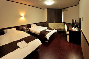 Down duvets, blackout curtains, iron/ironing board, free WiFi