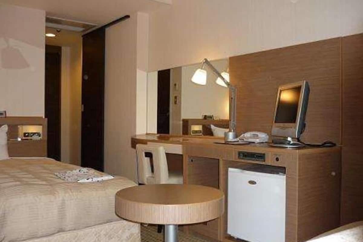 Down comforters, desk, blackout drapes, iron/ironing board