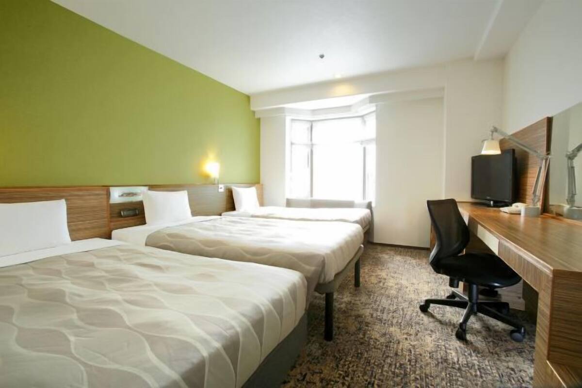 Down duvets, desk, blackout curtains, iron/ironing board (on request)
