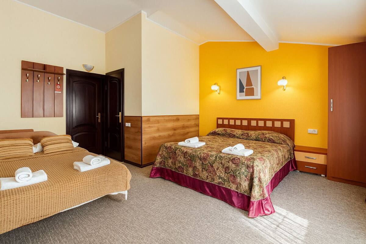 Family Quadruple Room, 1 Bedroom | 1 bedroom, desk, laptop workspace, blackout drapes