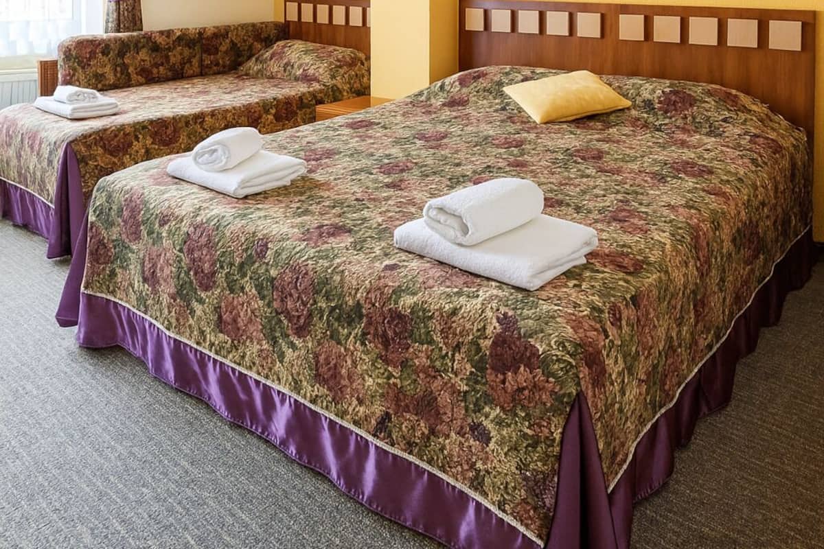 Superior Triple Room | 1 bedroom, desk, laptop workspace, blackout drapes